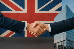 Dos personas dándonse la mano con la bandera de UK de fondo - LTD en Reino Unido